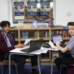 Students in the library working