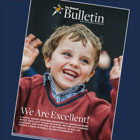 Happy child on front cover of Beacon Bulletin