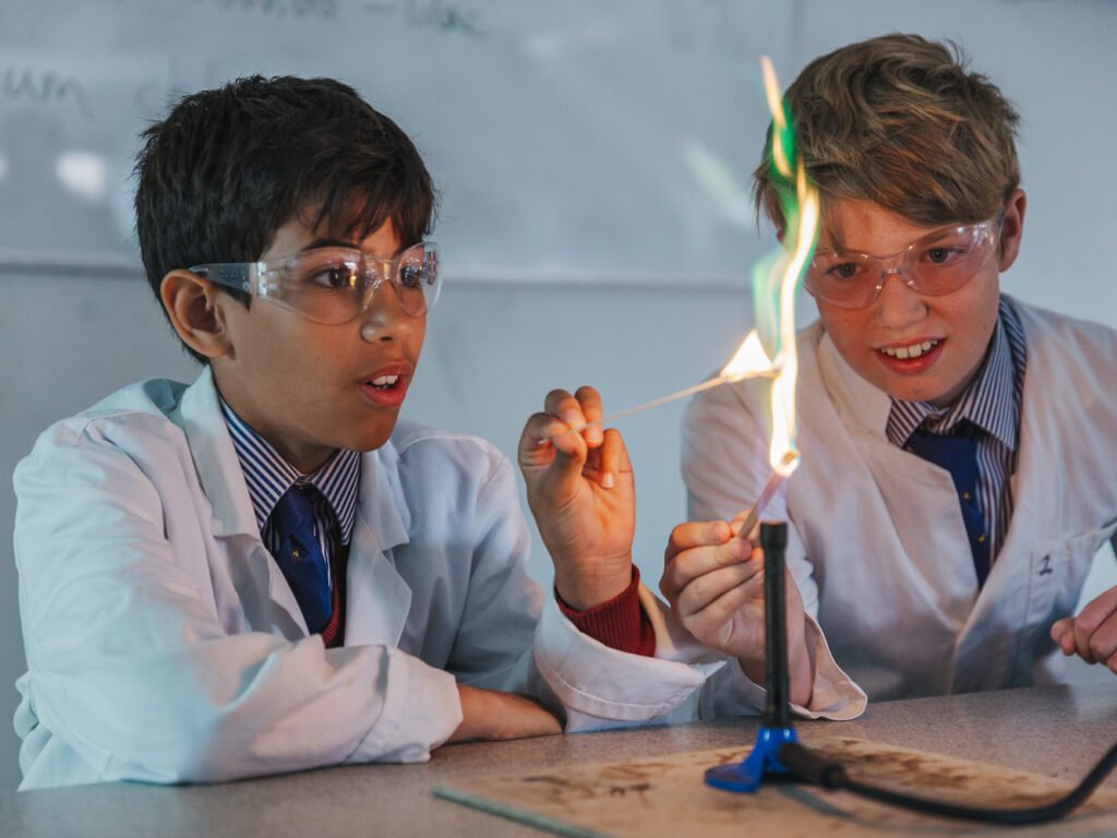 students using a bunsen burner
